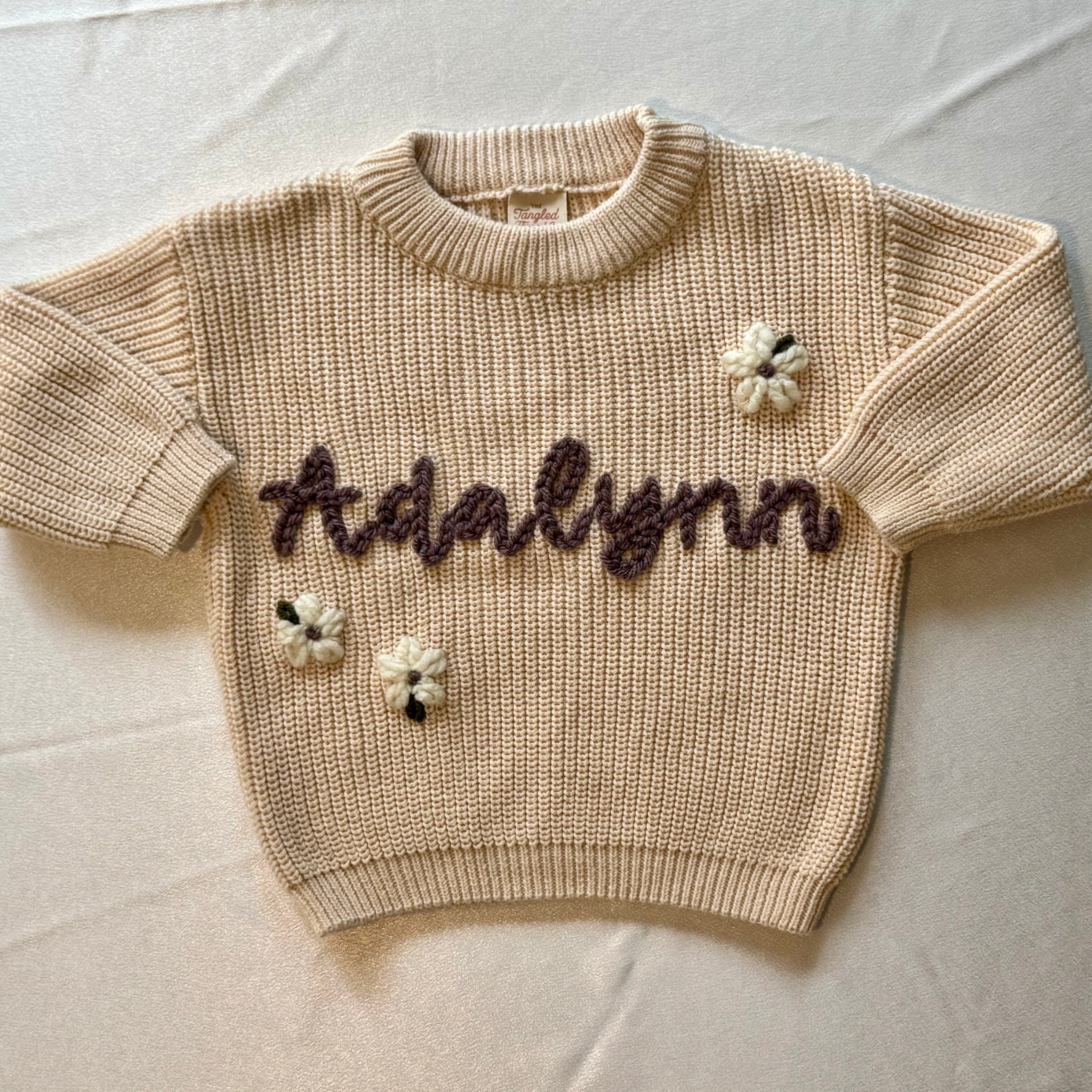 Custom embroidery by The Tangled Thread Co.