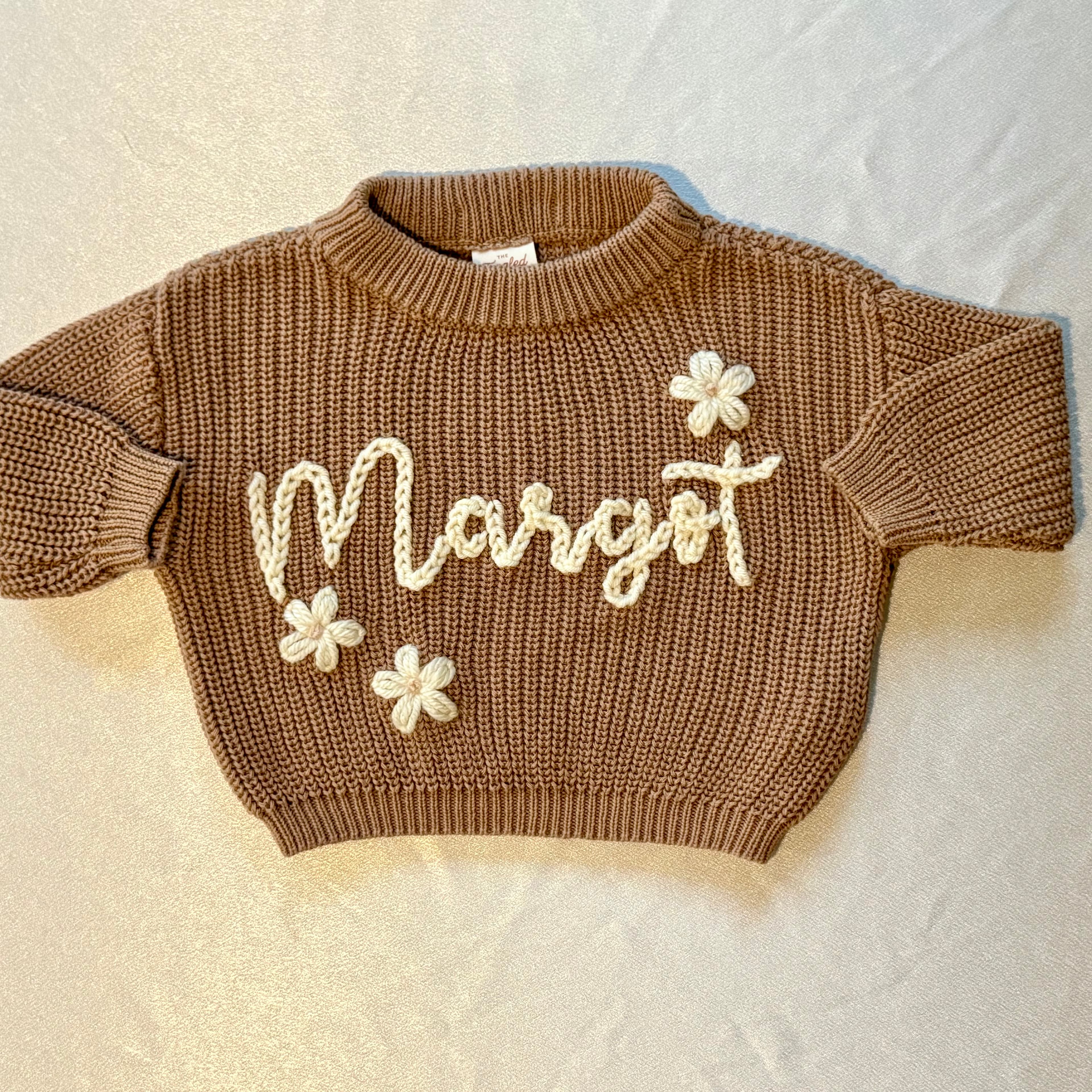 Custom embroidery by The Tangled Thread Co.